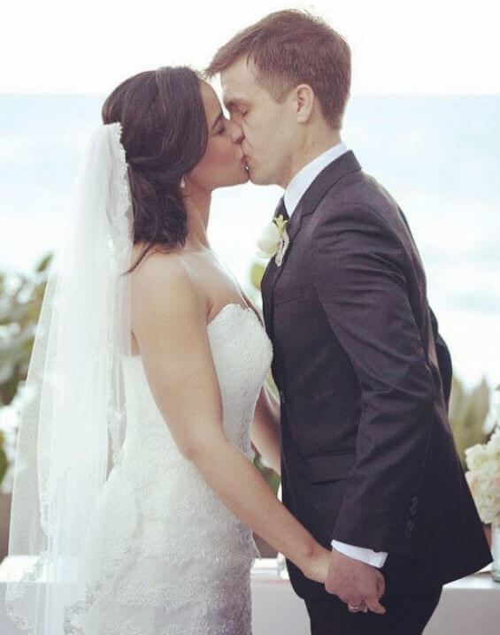 Jeff Palm with his wife, Sarah Cooper at their wedding.
